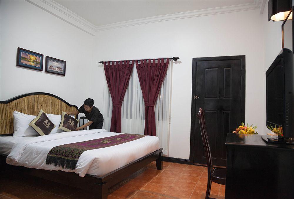 洱湾精品酒店wind Boutique Hotel Siem Reap Quarto foto